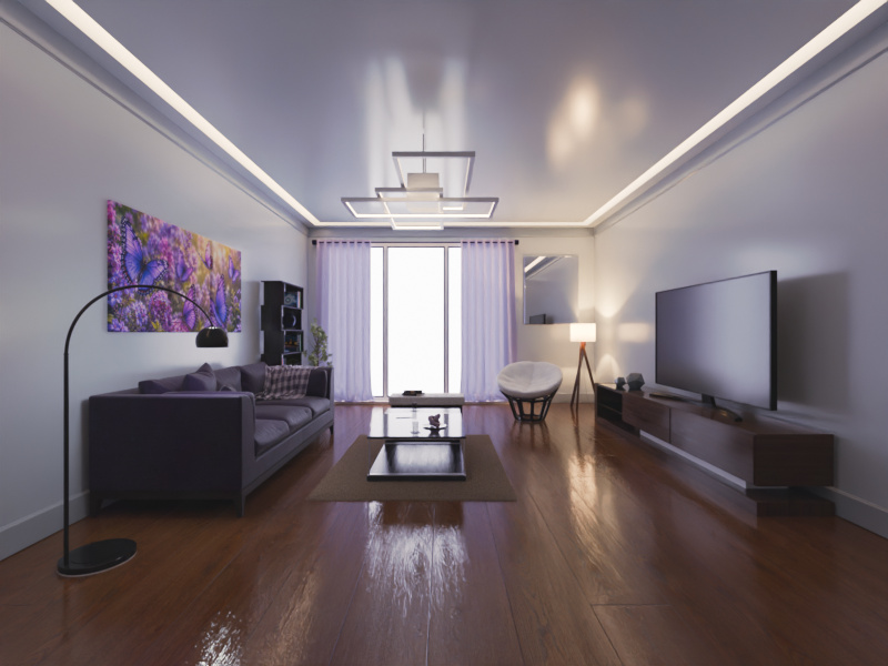 Wide view of the living room with media unit, floor lamp and wall art