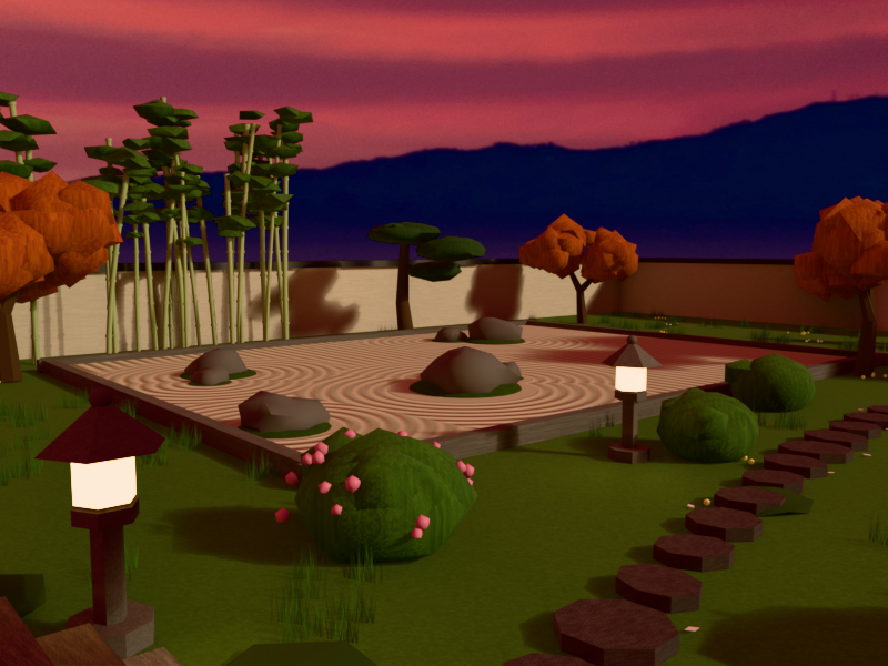 Karesansui dry garden with raked sand, boulders and stone lanterns at dusk